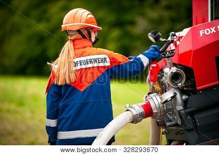 Germany, Niederstetten, Baden Wurttemberg. September 2019 Young Firefighters In Training