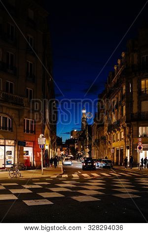 Strasbourg, France - Nov 23, 2017: View Of Esca Building And Notre-dame De Strasbourg Illuminated Ca
