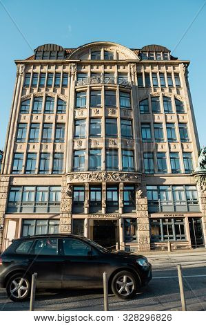 Hamburg, Germany - Mar 2018: Suv Driving In Front Of House Of Seefahrt Seafaring, South Facade On Th