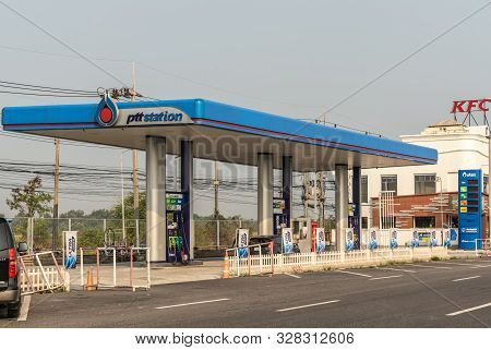 Chachoengsao, Thailand - March 17, 2019: Closeup Of Ptt Blue And White Gas Station Along Road Under 