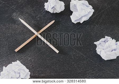 Overcoming Creative Block And Lack Of Productivity Concept, Pencils Next To Group Of Scrunched Paper