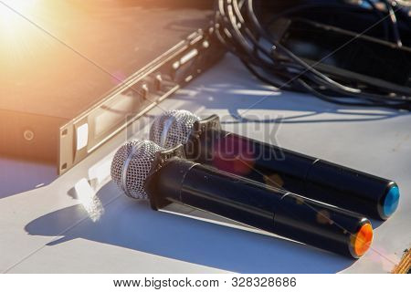 Microphone On Table The Blurred Photo Of Conference Hall For Seminar Room. Microphone Voice Speaker 