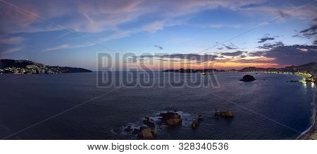 Tropical Landscape Of Acapulco Bay At Sunset