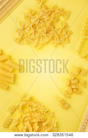 Italian Pasta, Flat Lay Banner With A Place For Text, An Overhead Shot On A Yellow Background, A Des
