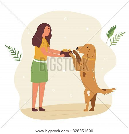 Young Cute Volunteer Girl Feeding Street Dog