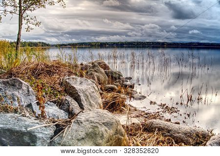 Pleasant Landscape, Nature, Sea View. The Sky In Thick Rain Clouds, The Rocky Shore And The Baltic S