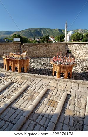 The Uneven Surface Of The Walkway Accross The Old Bridge (stari Most) With Decorative Handicrafts (s