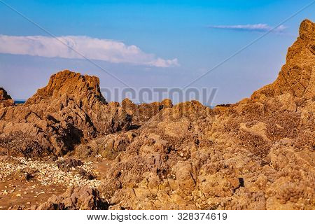 Wild Rocky Beach In Brittany On Armor Coastline.