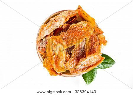 Heap Of Sun Dried Persimmon Slices Isolated On White Background. Top View
