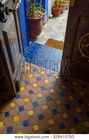 Traditional Moroccan entrance interior with traditional colorful tiles  