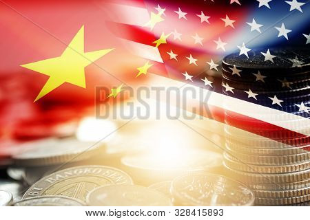 Usa And China Flag On Coins Stacking .it Is Symbol Of Economic Tariffs Trade War And Tax Barrier Bet