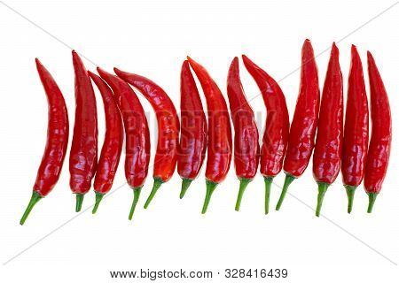 Close Up Red Hot Chili Spur Pepper At White Background