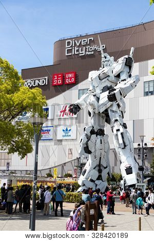 Tokyo, Japan - April 28, 2019, The Unidentified Traveler Look At Rx-0 Unicorn Gundam Statue In Norma