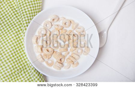 Delicious And Nutritious Cereal Loops In A Bowl With Milk For Healthy Breakfast For Kids