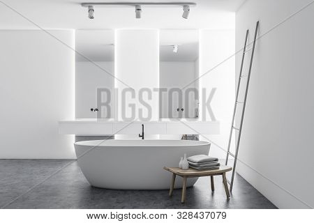 Interior Of Stylish Bathroom With White Walls, Concrete Floor, Double Sink With Vertical Mirrors, Co