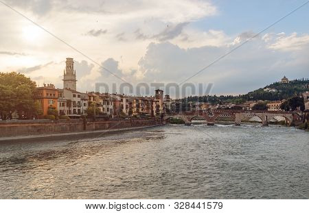 Panoramic View On The Dige River In The Evening In Verona. Italy
