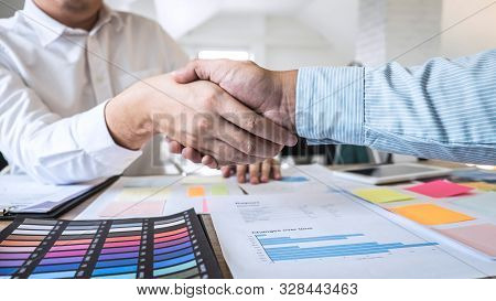 Finishing Up A Meeting Collaboration, Handshake Of Two Business People After Contract Agreement To B