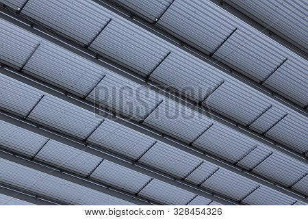 Light Grey Ribbed Ceiling Of Industrial Style