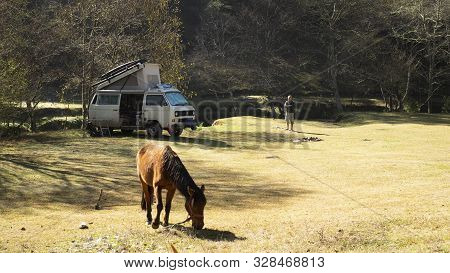 Encuentro Park, Chiapas, Mexico - February 28h, 2018: A Horse, A Man And A Van