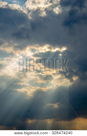 Rays Of Sunlight That Pass Through Gaps In The Clouds And Form Visible 