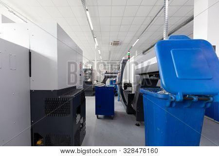 Inside Of Factory Unit With Containers Filled With Swarf