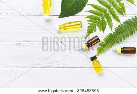 Aromatherapy Herbal Oil Bottles Aroma With Leaves Herbal Formulations Including Wildflowers And Herb