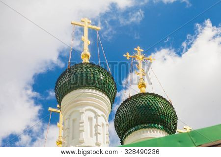Closeup On Ornated Cross On The Dome Of Church Of Chernigov Wonderworkers