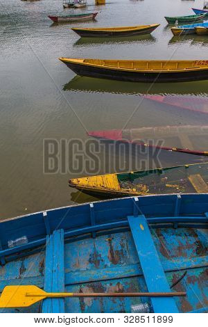 Colorful Boats In Fewa Lake After The Storm In Pokhara, Nepal