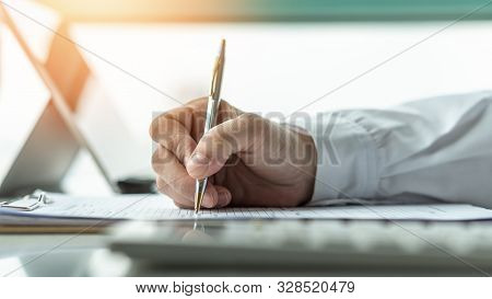 Paperwork Document, Claim Form With Business Applicant Or Administrative Person Filling In Company A