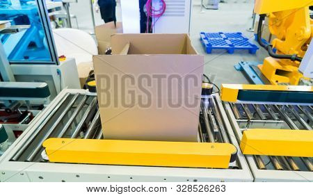 boxes in the cells of the automated warehouse. Metal construction warehouse shelving