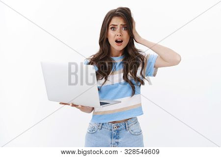 Upset Gloomy Troubled Cute Woman Hold Laptop Grab Head, Gasping Worried, Drop Jaw And Panicking Have