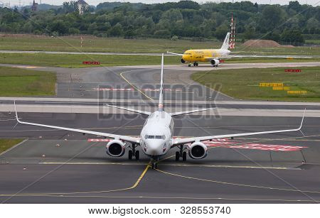Airplane Taxi In Dusseldorf Airport