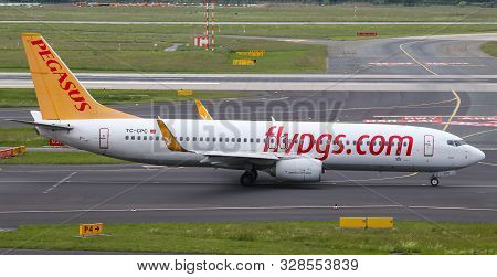 Airplane Taxi In Dusseldorf Airport