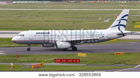 Airplane Taxi In Dusseldorf Airport