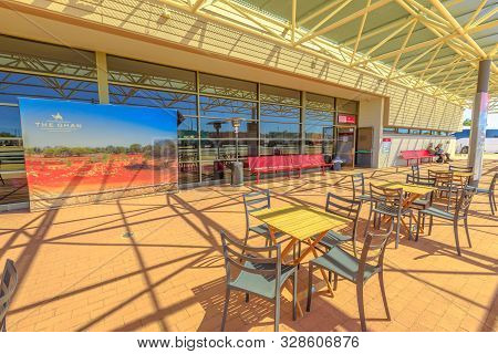 Alice Springs, Northern Territory, Australia - Aug 29, 2019: Tables And Chairs Under The Lodge Of Th