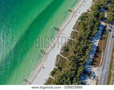 Aerial View Of Coquina Beach White Sand Beach And Turquoise Water In Bradenton Beach During Blue Sum