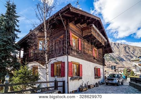 Livigno, Italy, April 2016 Traditional Alpine Wooden Architecture In The Village, Wooden House, Livi