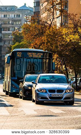 Car Traffic At Rush Hour In Downtown Area, Victoriei Boulevard (calea Victoriei) In Bucharest, Roman