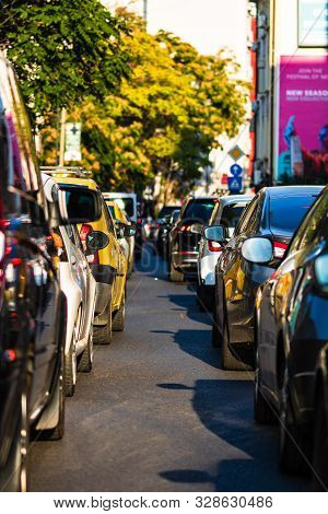 Car Traffic At Rush Hour In Downtown Area, Victoriei Boulevard (calea Victoriei) In Bucharest, Roman