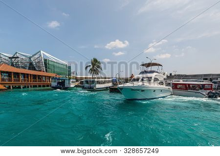 Hulhule Island, Maldives - November 18, 2017: Speed Boat At The Hulhule Port Near Ibrahim Nasir Inte