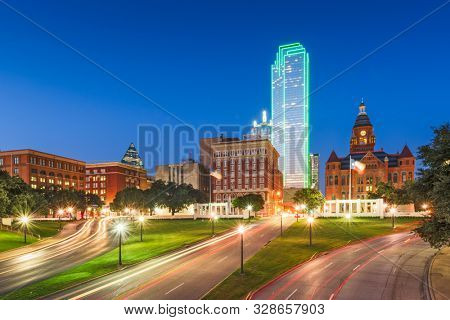 Dallas, Texas, USA skyline over Dealey Plaza at twilight.