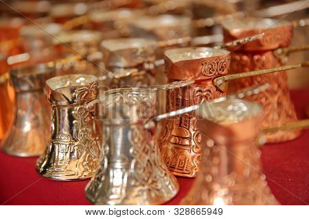 Close-up On Traditional Bosnian Copper Coffee Pots In Kazandziluk Street, The Famous Coppersmith Tra