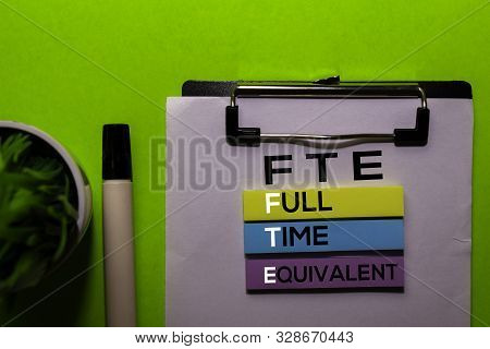 Fte. Full Time Equivalent Acronym On Sticky Notes. Office Desk Background