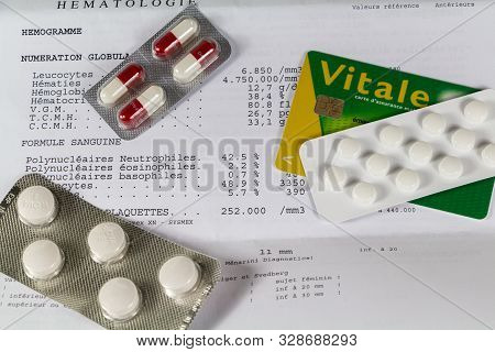 Primelin - France, December 11 : Results Of Blood Test Written In French Language, Packs Of Pills An