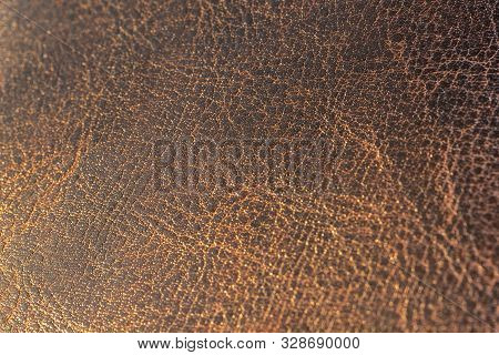 Brown Leather Texture Closeup. Useful As Background For Design-works.