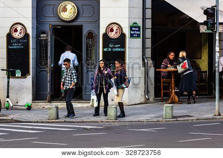 Pedestrians Waiting To Cross The Street In Bucharest, Romania, 2019