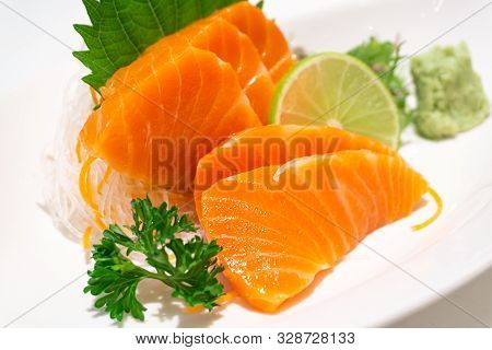 Premium Salmon Sashimi Slice On A White Plate,japanese Food