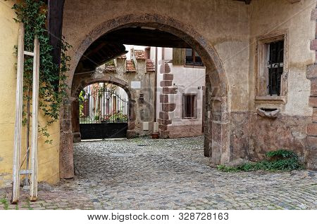 Riquewihr, France, October 13, 2019 : Old Streets Of The Medieval Village. Popular Tourist Attractio