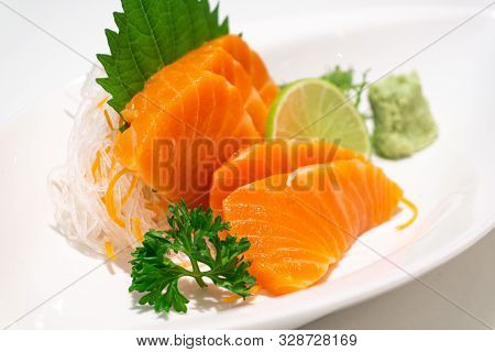 Premium Salmon Sashimi Slice On A White Plate,japanese Food