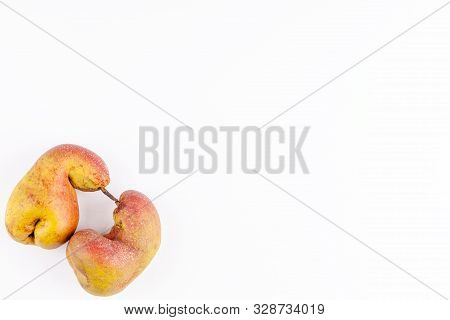Ugly Fruits - Organic Ripe Pears On White Background. Concept Of Zero Waste Production In Food Indus